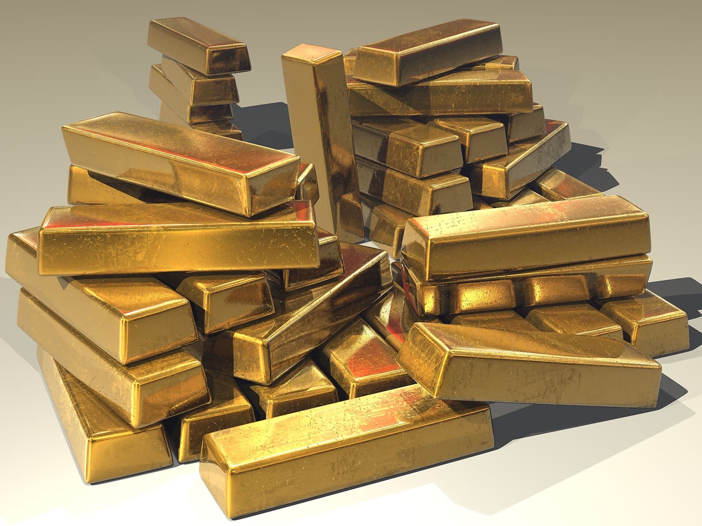 Stacked cast gold bullion bars (illustrative)