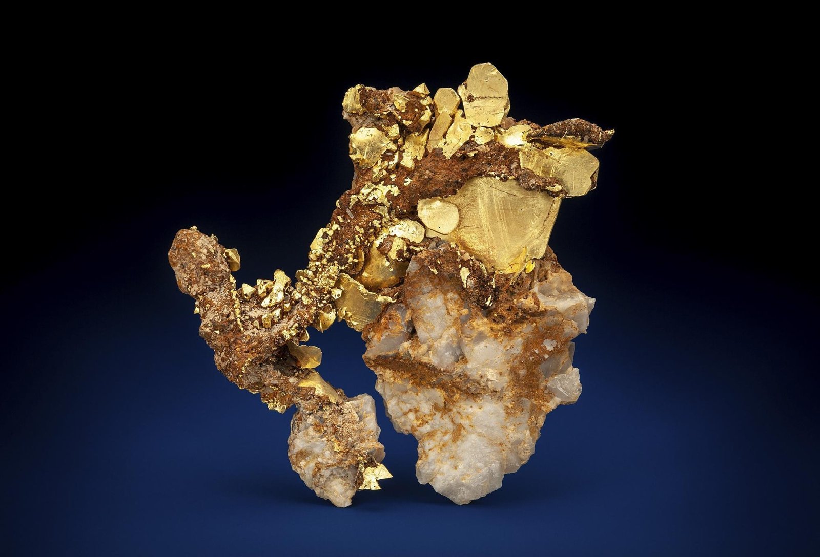 Crystalline native gold on quartz (illustrative)